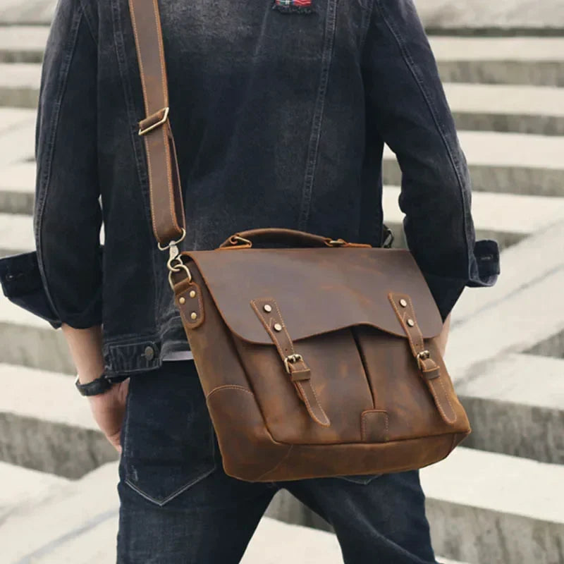 a man wearing a leather shoulder bag