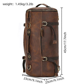 Presenting the Vintage Leather Travel Backpack, ideal for the stylish traveler. This stunning brown leather backpack is shown upright and features multiple straps and buckles. Made from genuine cowhide leather, it measures 45cm tall, 23cm wide, and 23cm deep, with a manageable weight of 1.45kg or 3.2lb.