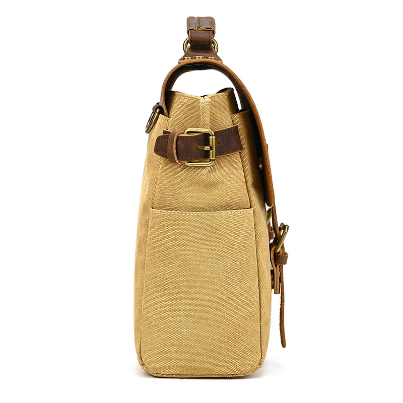 Side view of the Canvas & Leather Vintage Messenger Bag, showcasing its tan canvas body with genuine leather straps and brass buckles. It exudes a subtle business style, featuring a side pocket and top loop.