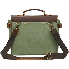 The Canvas & Leather Vintage Messenger Bag is a stylish men's business briefcase with a green canvas body, brown cow leather accents, a sturdy handle, detachable shoulder strap, brass hardware, and multiple pockets for organization.