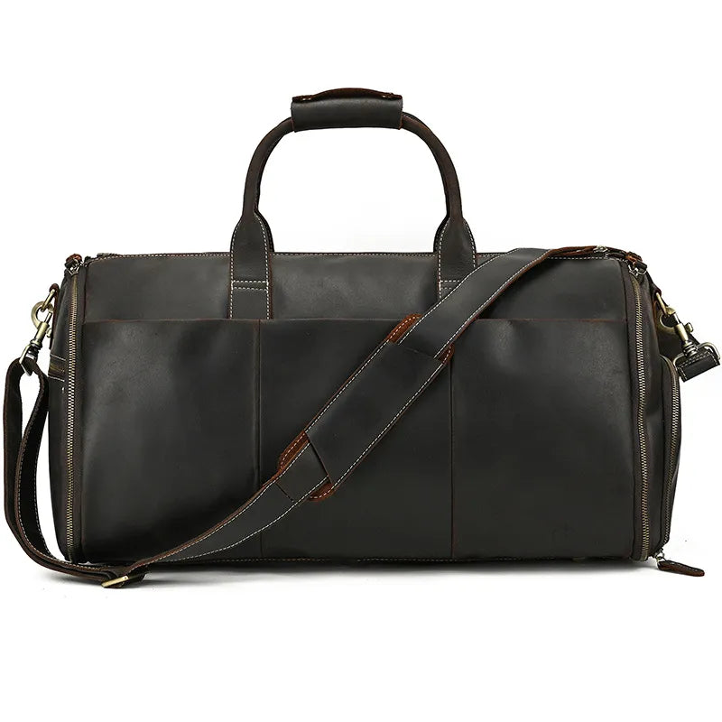 The Luggage 22 Leather Travel Duffle Bag, crafted from genuine leather and featuring dual handles with a removable strap, showcases durable alloy hardware such as zippers and buckles. Its reinforced stitching along the seams ensures longevity. With a simple yet spacious design, this black duffel is ideal for travel or gym use.