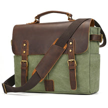 The Canvas & Leather Vintage Messenger Bag is a stylish men's business briefcase in green canvas with a cow leather flap, featuring metal buckles, a top handle, an adjustable shoulder strap, side pockets, and brass accents for a vintage yet modern look.