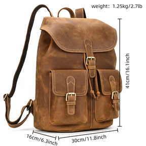 The Vintage Leather Backpack, crafted from genuine cowhide, includes two front pockets with buckle closures. It offers adjustable straps for comfortable wear and measures 41cm in height, 30cm in width, and 16cm in depth. Weighing 1.25kg, it's ideal for carrying your travel essentials.