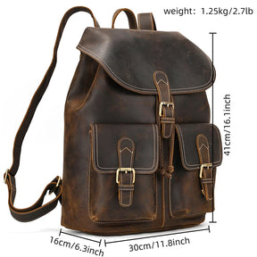 The Vintage Leather Backpack is expertly crafted from genuine cowhide leather and features three front pockets with buckle closures. It is ideal for travel essentials, measuring 41 cm (16.1 inches) in height, 30 cm (11.8 inches) in width, and 16 cm (6.3 inches) in depth, with a weight of only 1.25 kg (2.7 lb).