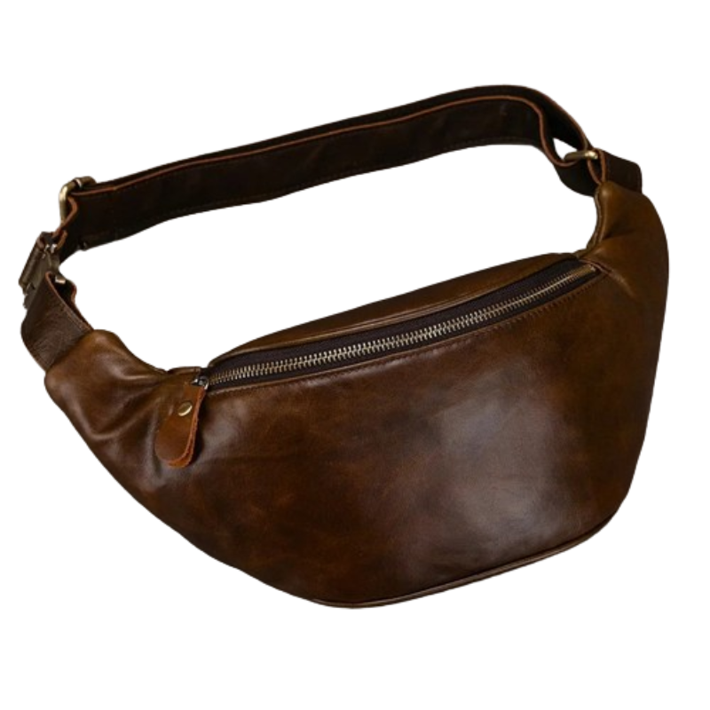 The Leather Belt Bag is a brown leather fanny pack equipped with a silver zipper and an adjustable strap. Crafted from genuine cowhide leather, this sleek, unadorned belt bag features durable alloy hardware, making it perfect for carrying small essentials.