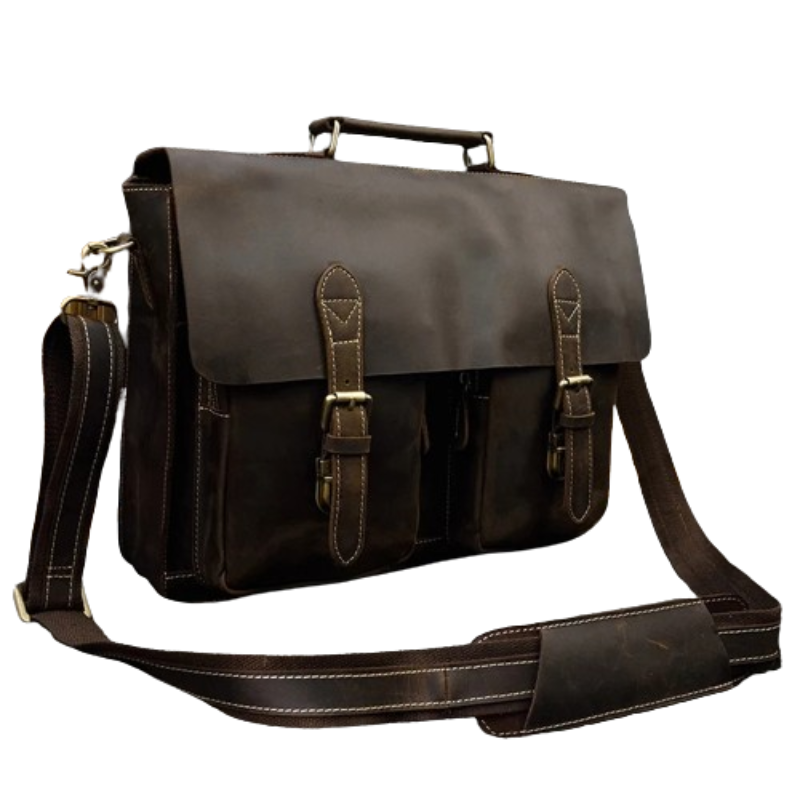 The Leather 16" Business Briefcase is a dark brown leather satchel featuring a top handle and an adjustable shoulder strap. It boasts two front buckle straps and a double pocket design for added storage. Crafted from genuine cowhide leather, the material is smooth with visible stitching details.