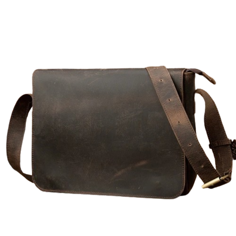 The Vintage Leather Shoulder Bag is crafted from genuine cowhide leather and features a brown, rugged exterior with an adjustable strap and a flap closure. Its worn and utilitarian aesthetic, combined with its practical design, makes it both a stylish and functional accessory.